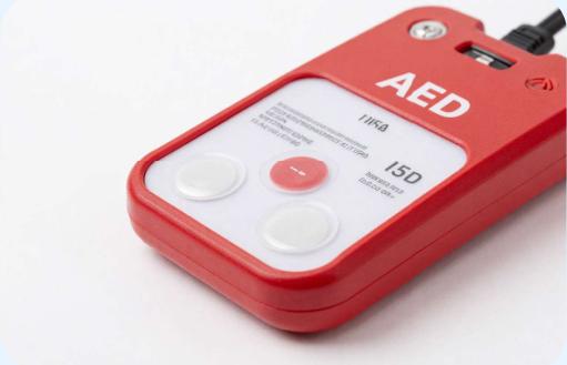 Red AED trainer device used in class